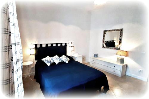 Ein Bett oder Betten in einem Zimmer der Unterkunft Casa Vacanze Longo