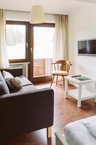 TV a/nebo společenská místnost v ubytování Der Bären in Zell