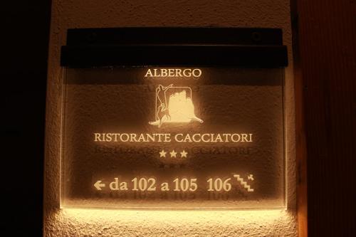 a bottle of albergo agricole caccorotaotentotentotentotent at Albergo Ristorante Cacciatori in Auronzo di Cadore