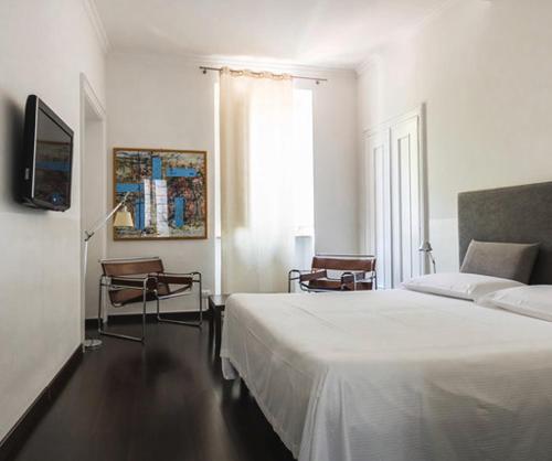 Posteľ alebo postele v izbe v ubytovaní B&B Via Stampatori