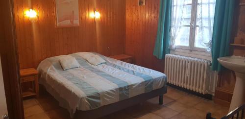 Postel nebo postele na pokoji v ubytování LiseManu