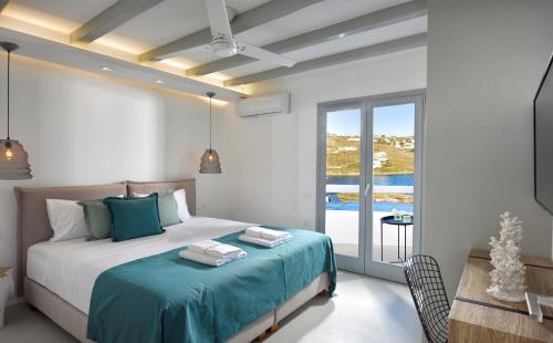 Ένα ή περισσότερα κρεβάτια σε δωμάτιο στο Villa Nolita by Blanco Villas