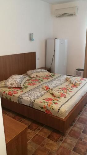 Ένα ή περισσότερα κρεβάτια σε δωμάτιο στο MIOARA Rooms parter