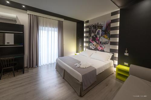 Postel nebo postele na pokoji v ubytování HOLYGOLD Suite ****
