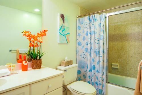 a bathroom with a toilet and a shower at Sunny Isles Ocean Reserve Condo Apartments - 1BR #812 in Miami Beach