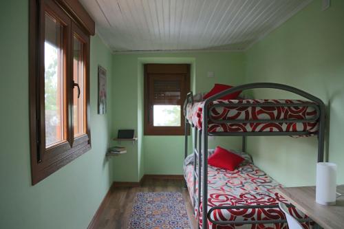 A bed or beds in a room at A Casa Da Asturiana