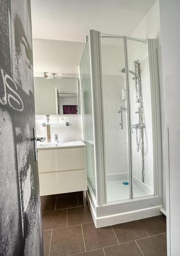 a bathroom with a shower and a sink at Best Western Le Vinci Loire Valley in Amboise