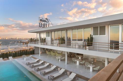 an rendering of the rooftop of a building with a pool at Hotel Boutique Casa Lulu in Mazatlán