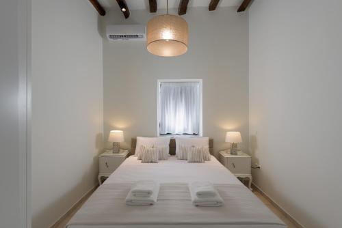 Postel nebo postele na pokoji v ubytování Kite Blue Villas