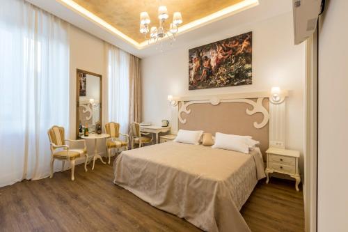 Posteľ alebo postele v izbe v ubytovaní Palace of Dreams Rooms