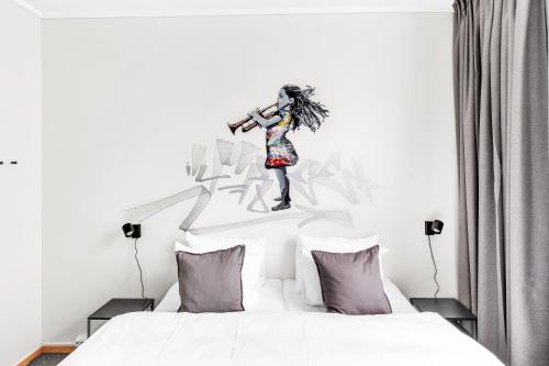 Krevet ili kreveti u jedinici u okviru objekta Lille Hotell