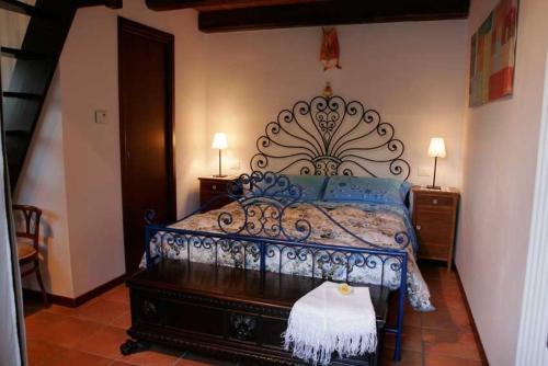 Postel nebo postele na pokoji v ubytování B&B Terra Di Mezzo