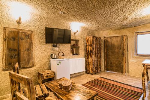 Kuchyň nebo kuchyňský kout v ubytování Cappadocia Ennar Cave Swimming Pool Hot & SPA