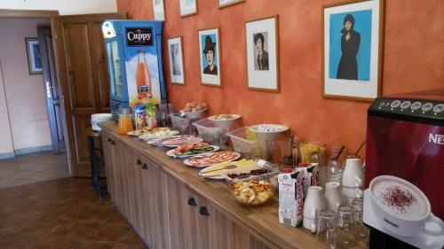 a buffet line with food on top of it at Penzion Oliver in Žacléř