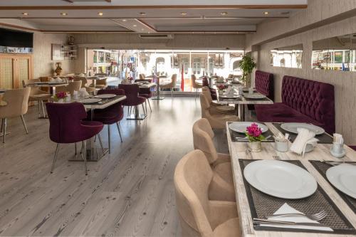 En restaurant eller et andet spisested på Regno Hotel