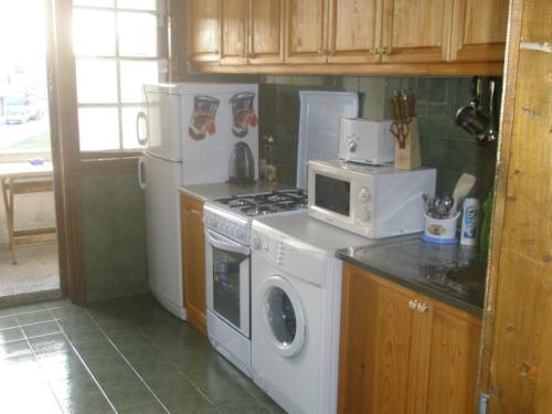 Kuchyň nebo kuchyňský kout v ubytování Апартамент КИМАКО, 100м2 на цена за хотелска стая за двама