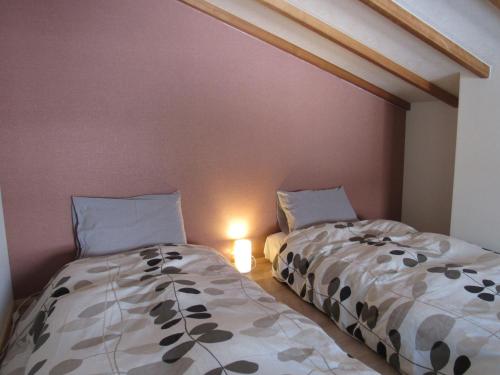 Cama o camas de una habitación en Lodge Nakajima