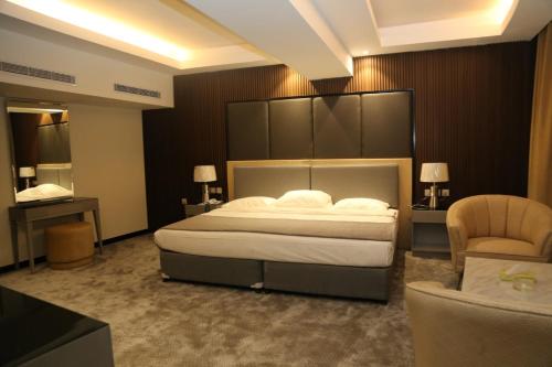 Cama o camas de una habitación en Assalam Palace