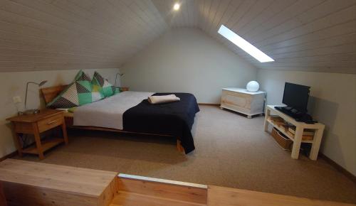 Säng eller sängar i ett rum på Walddomizil Kleinmachnow