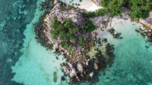 an aerial view of a small island in the ocean at Wapi Resort in Ko Lipe