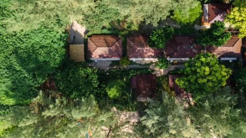 an overhead view of a house in a forest at Wapi Resort in Ko Lipe
