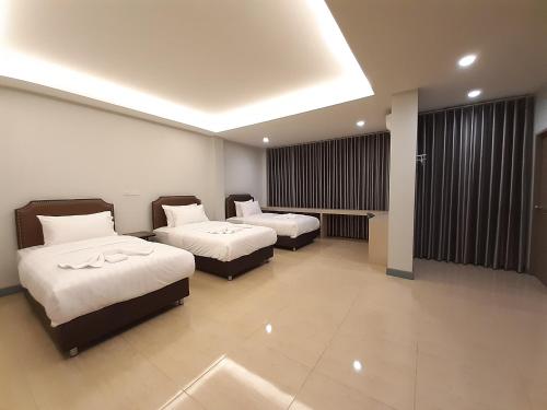 Postel nebo postele na pokoji v ubytování Zleep D Hotel