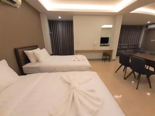 Postel nebo postele na pokoji v ubytování Zleep D Hotel