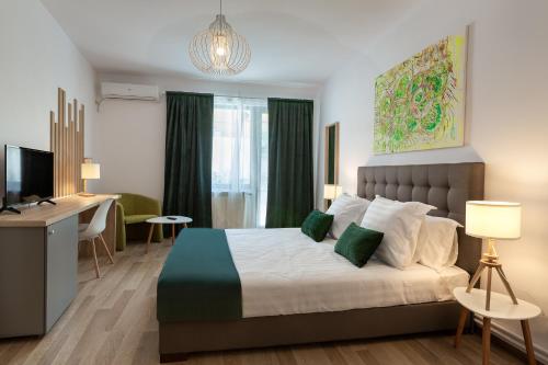 Postel nebo postele na pokoji v ubytování Lagom Hotel