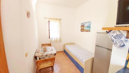 Ένα ή περισσότερα κρεβάτια σε δωμάτιο στο Appartamenti Costanza