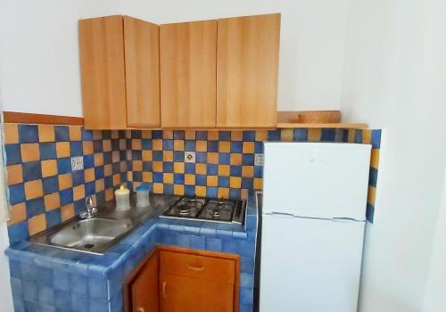 Η κουζίνα ή μικρή κουζίνα στο Appartamenti Costanza