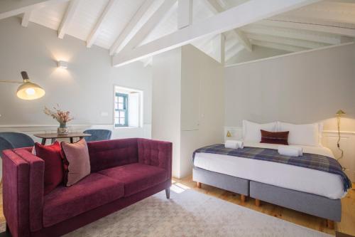 Postel nebo postele na pokoji v ubytování Porto Toja Apartments