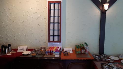 a table with many items on top of it at Hotel & Pension Plagwitzer Hof in Leipzig