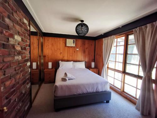 Krevet ili kreveti u jedinici u objektu Hunter Habit Cottages