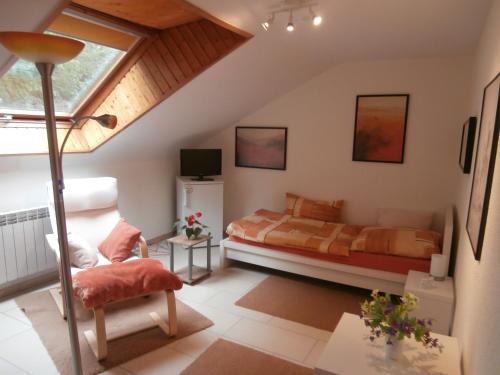 Giường trong phòng chung tại schöne Wohnung nahe Messe Stuttgart und Flughafen für 1-4 Gäste