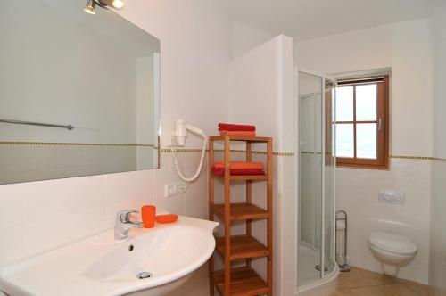 Ванна кімната в Weinhof Mumelter
