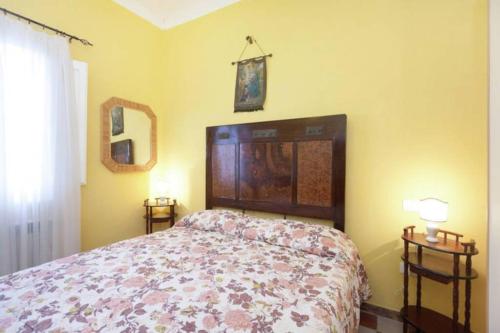 Säng eller sängar i ett rum på Casa Vacanze Wellness La Rocca