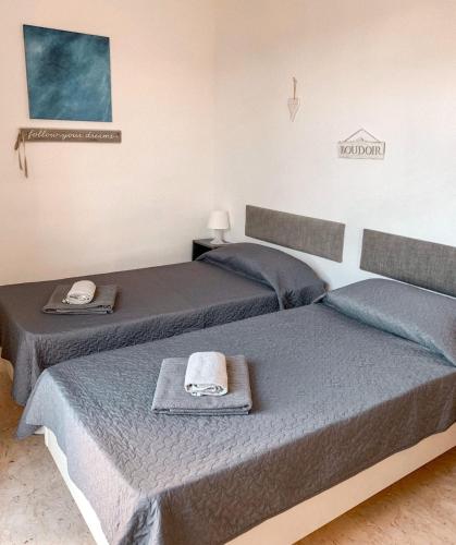 Ένα ή περισσότερα κρεβάτια σε δωμάτιο στο Villa Zammitella