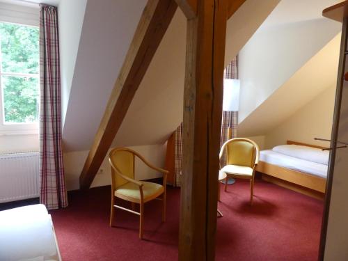 Landgasthaus Hotel Eggert tesisinde bir odada yatak veya yataklar