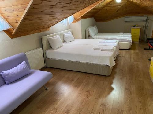 Un ou plusieurs lits dans un hébergement de l'établissement Villa Acar - 4 Bedroom Villa in Dalyan Center, Private Pool&Garden