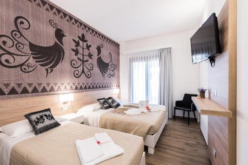 Ένα ή περισσότερα κρεβάτια σε δωμάτιο στο Relais del Borgo- Domo