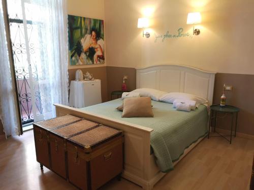 Cama ou camas em um quarto em Relais Villa Fiorelli