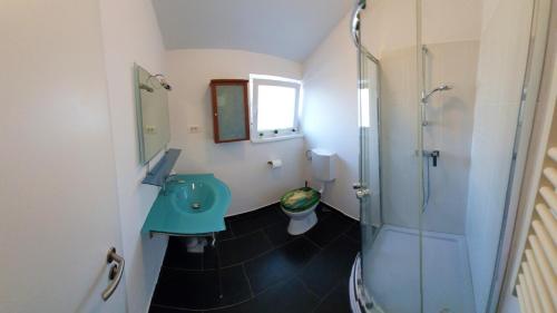 Koupelna v ubytování Palmarin