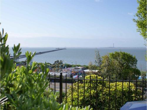 a view of the ocean from behind a fence at Hamiltons Boutique Hotel in Southend-on-Sea