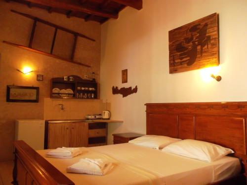 Voodi või voodid majutusasutuse Villa Orestis toas