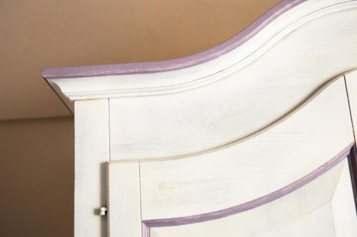 a white door with a purple trim at Vincafè in Alba