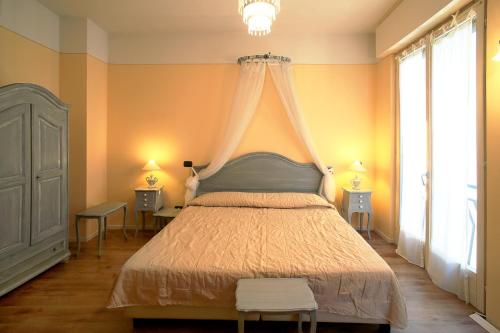 Giường trong phòng chung tại Appartamenti Piazza Umberto I