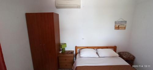 Katil atau katil-katil dalam bilik di Ambeles Apartments