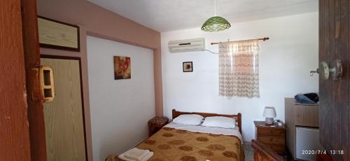 Katil atau katil-katil dalam bilik di Ambeles Apartments