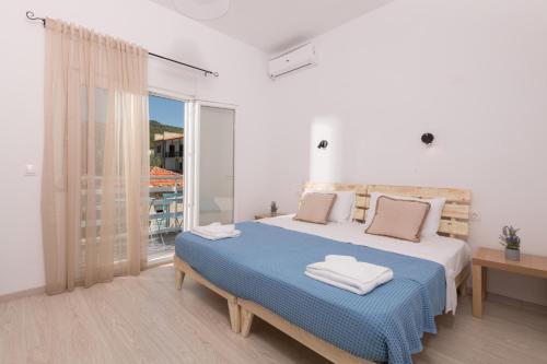 Posteľ alebo postele v izbe v ubytovaní Marion Apartments
