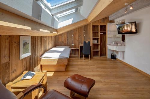 TV a/nebo společenská místnost v ubytování Hotel Matterhornblick